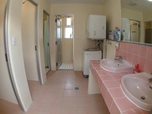 Een badkamer bij Okinawa Resort