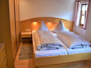 Llit o llits en una habitació de Ferienhof Schauer