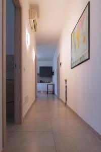 A television and/or entertainment centre at Casa Vacanza MariaTeresa