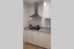 Kuchyňa alebo kuchynka v ubytovaní Apartament a 2 min de la platja