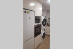 Kuchyňa alebo kuchynka v ubytovaní Apartament a 2 min de la platja
