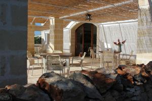 A seating area at Masseria Zambardo