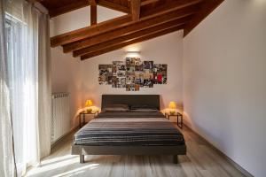 Un pat sau paturi într-o cameră la Ca' de Paggia