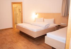 A bed or beds in a room at Apart welcom