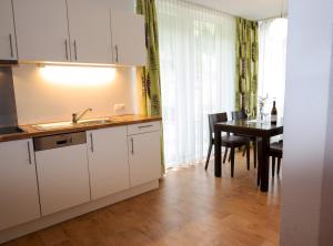 A kitchen or kitchenette at Apart welcom