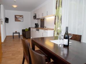 A kitchen or kitchenette at Apart welcom