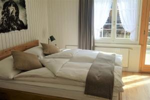 Voodi või voodid majutusasutuse Hotel Bären Guttannen toas