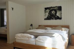 Voodi või voodid majutusasutuse Hotel Bären Guttannen toas