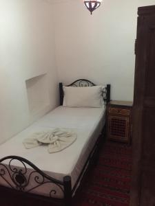 Postel nebo postele na pokoji v ubytování Riad Dar Lilas