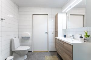 Koupelna v ubytování Langfoss + 5 fotografií