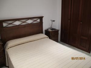 A bed or beds in a room at URBANIZACION EL ATARDECER
