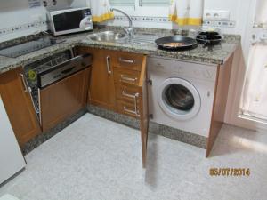 A kitchen or kitchenette at URBANIZACION EL ATARDECER