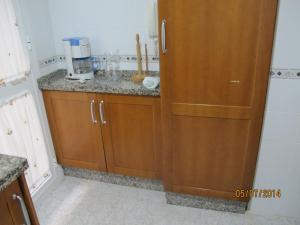 A kitchen or kitchenette at URBANIZACION EL ATARDECER