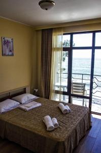Postel nebo postele na pokoji v ubytování Hotel Medusa