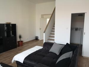 Posezení v ubytování Fine apartment in centrum of Slaný with Aircondition