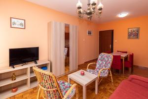 TV a/nebo společenská místnost v ubytování Casa Oleander