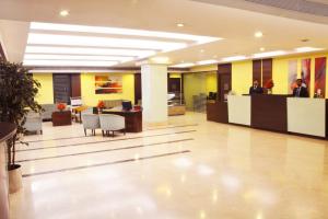 Lobbyn eller receptionsområdet på Ashraya International Hotel