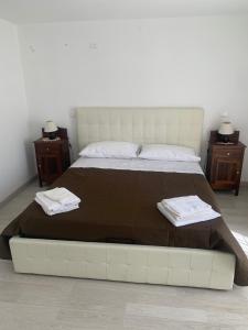 Postel nebo postele na pokoji v ubytování Villa Mary