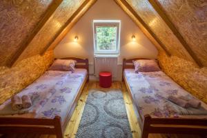Postel nebo postele na pokoji v ubytování Apartments Dedeic