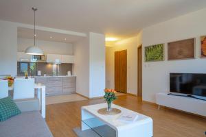 Kuchyňa alebo kuchynka v ubytovaní RentPlanet - Apartamenty Górna Resorts