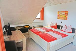 Un pat sau paturi într-o cameră la Winzerhof Spengler