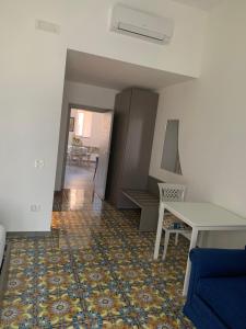 Predel za sedenje v nastanitvi Specchio di Parthenope B&B