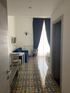 Postelja oz. postelje v sobi nastanitve Specchio di Parthenope B&B