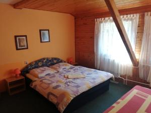 Voodi või voodid majutusasutuse Hotel Fran toas