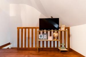 TV/trung tâm giải trí tại Galeria Grafit Apartments