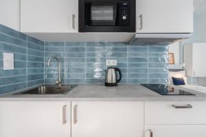Kuchyňa alebo kuchynka v ubytovaní A13- Boutique Apartments, Best Location, by BQA