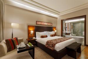 En eller flere senge i et værelse på Crowne Plaza Today Gurugram, an IHG Hotel