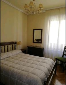 Llit o llits en una habitació de Apartamento Santo Domingo de la Calzada La Rioja