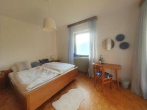 Postel nebo postele na pokoji v ubytování Voldersberghof