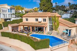 an aerial view of a house with a swimming pool at 3380 Villa Mar Flores in Moraira