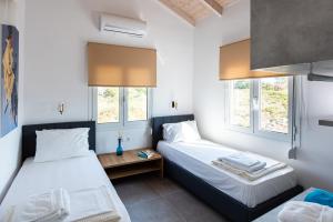 Postel nebo postele na pokoji v ubytování Villa Kiara 2