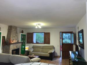 Posezení v ubytování Casa en valle del Tus