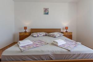 Posteľ alebo postele v izbe v ubytovaní Lovely House LINDI in Poreč
