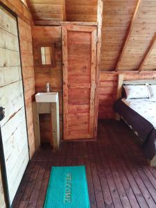Postel nebo postele na pokoji v ubytování Glamping Rionegro- arrayanes