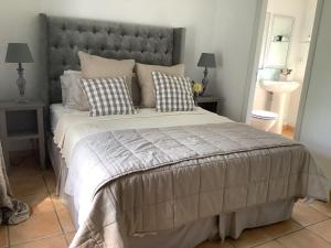 Letto o letti in una camera di The Courtyard