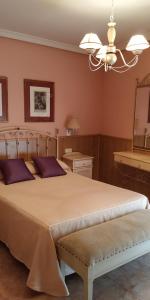 A bed or beds in a room at Hosteria Gante