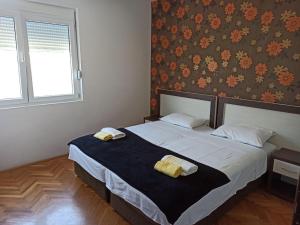Postel nebo postele na pokoji v ubytování Apartman Playa