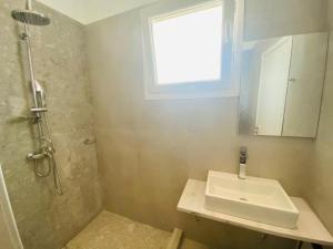 Um banheiro em Fabrica Sunset Apartments