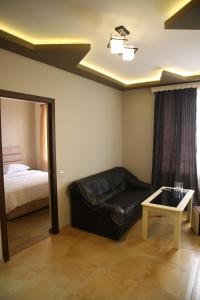 Postel nebo postele na pokoji v ubytování Hotel Gold