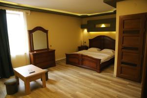 Postel nebo postele na pokoji v ubytování Hotel Gold