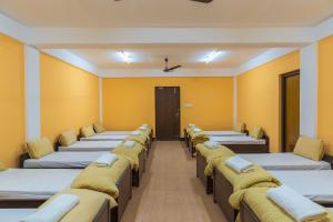 Rúm í herbergi á Hotel Ananda Pashupati