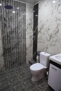 Koupelna v ubytování Hotel Gold