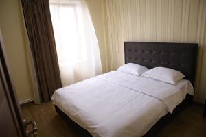 Postel nebo postele na pokoji v ubytování Hotel Gold