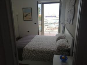 Posteľ alebo postele v izbe v ubytovaní Monopoli guest house BA07203091000019440