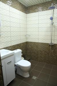 Koupelna v ubytování Hotel Gold