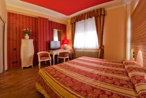 Voodi või voodid majutusasutuse Hotel Cles toas